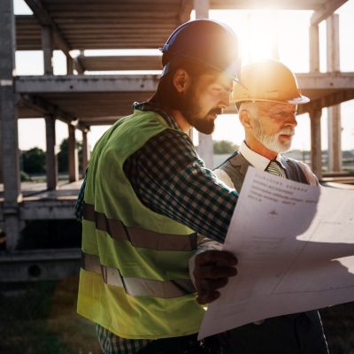 Picture of construction engineer, architect working on building site