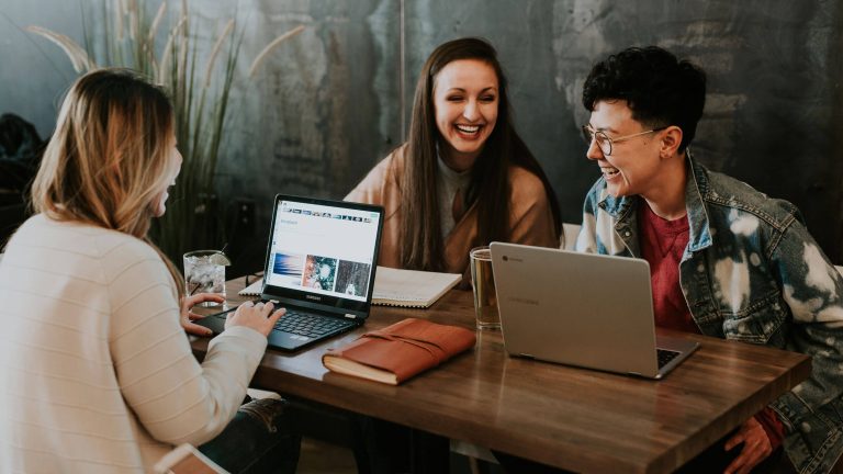 Three marketing specialists doing important work